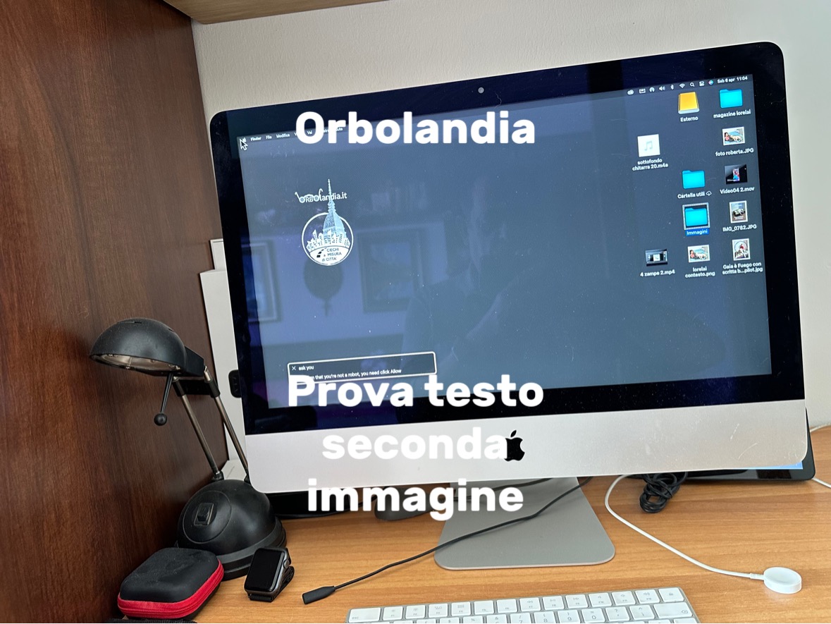 nell’immagine una foto scattata a un computer alla quale è stato aggiunto un testo di prova per il tutorial