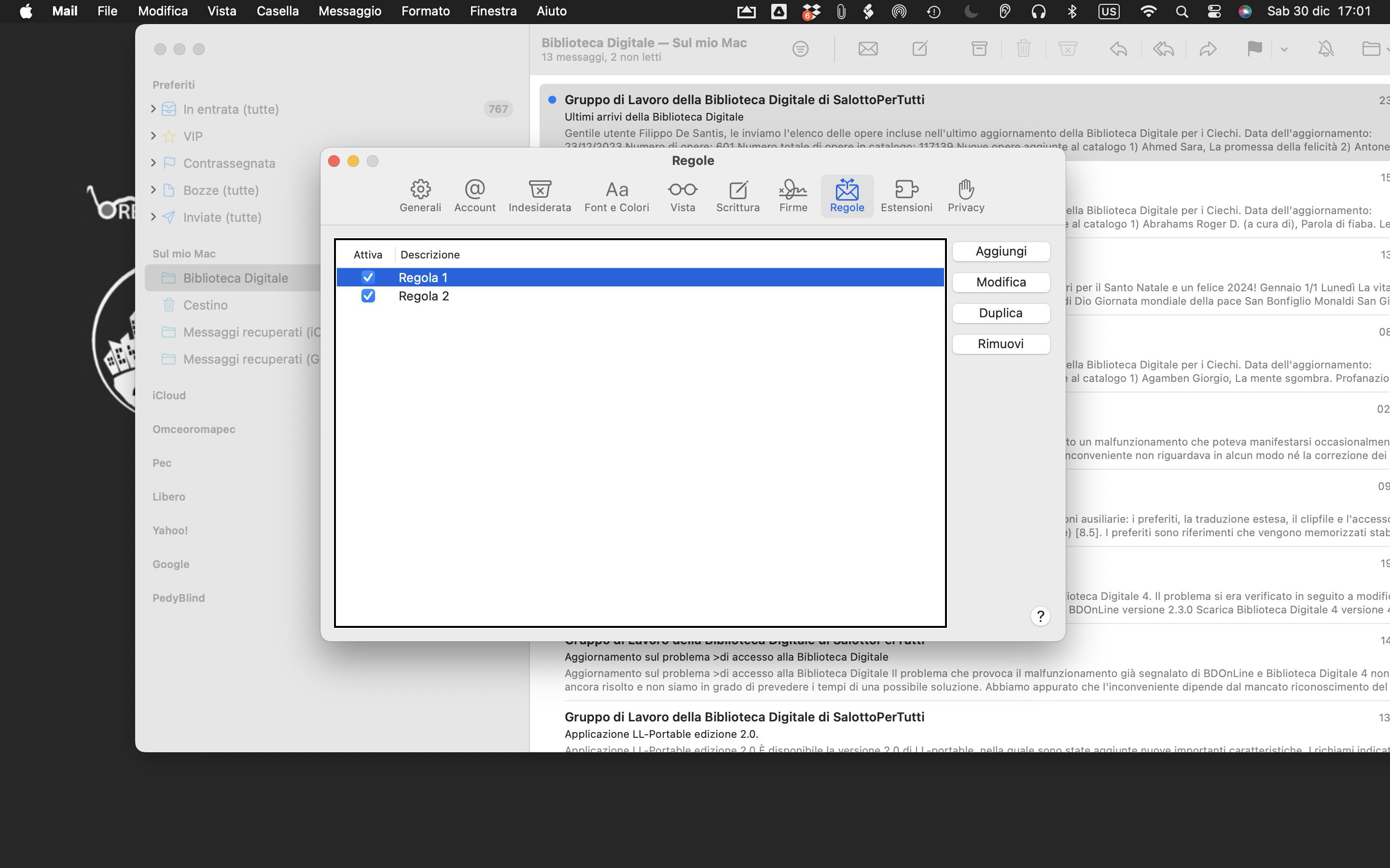 L'immagine mostra l'applicazione Mail per la gestione della posta elettronica su un computer Mac,
La barra laterale dell'applicazione mostra  le caselle configurate per i diversi account di posta elettronica, come iCloud, Google, Yahoo!, e altri, 
È visibile un piccolo menu a tendina aperto con le opzioni per Aggiungere, Modificare, Duplicare e Rimuovere, relative alle regole per la gestione delle email
